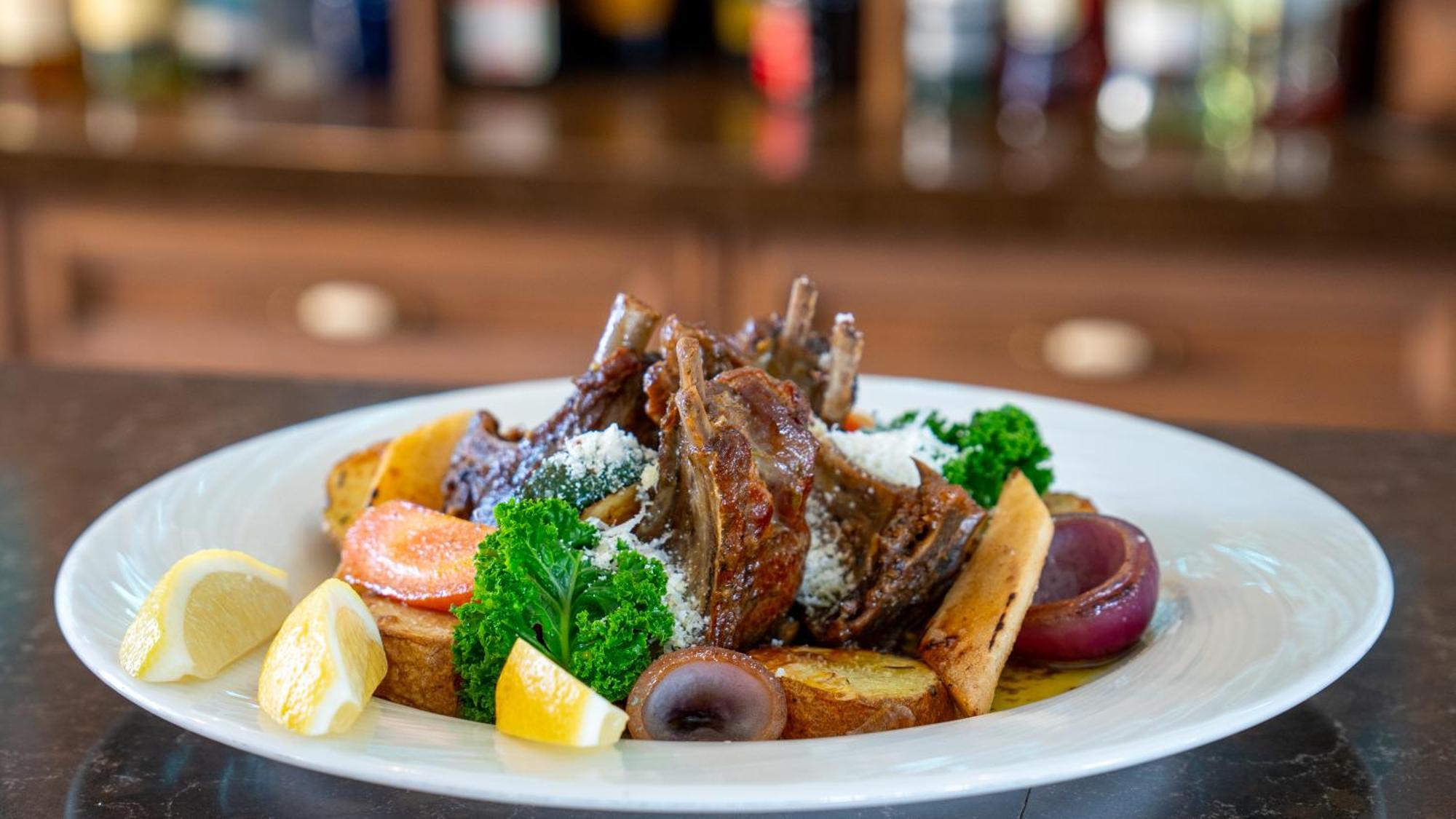 Boutique Odyseja & Spa Цехоцинек Экстерьер фото A plate of grilled lamb chops