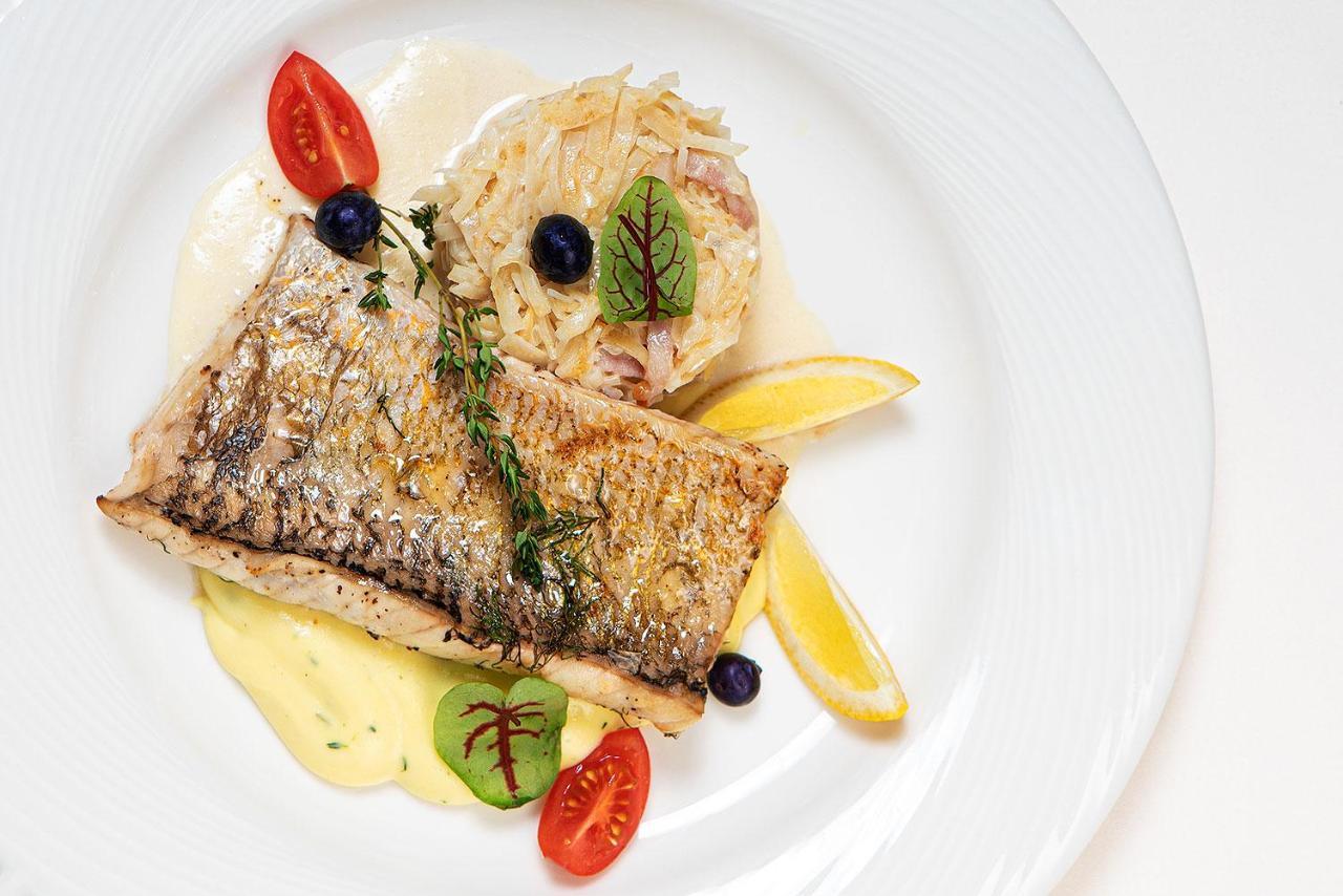 Boutique Odyseja & Spa Цехоцинек Экстерьер фото A prepared dish of Arctic char