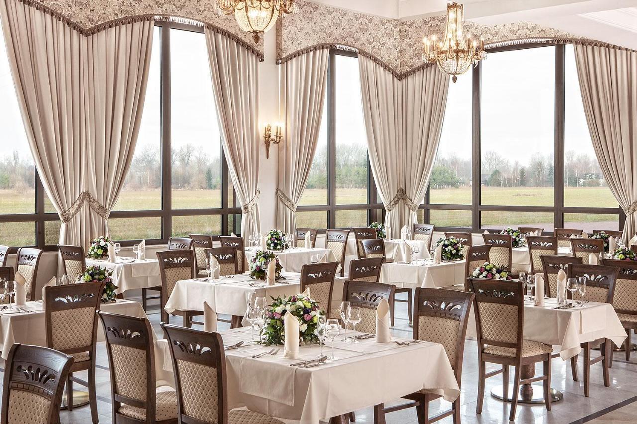 Boutique Odyseja & Spa Цехоцинек Экстерьер фото Restaurant